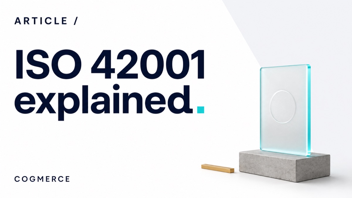 A frosted glass tablet bearing a blind-embossed plain ring seal on a concrete podium